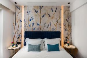 מיטה או מיטות בחדר ב-New York Luxury Suites