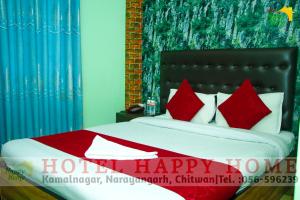 Hotel Happy Home客房内的一张或多张床位