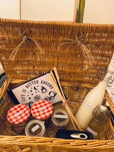 a wicker basket with some items in it at Duneden Belle Glamping in Randalstown