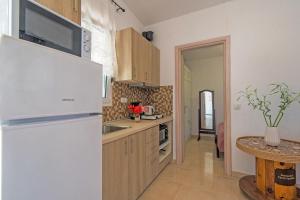 Kuchyň nebo kuchyňský kout v ubytování Country House Patsou + 24 fotografií