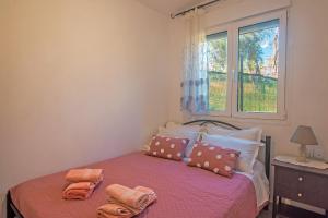 Postel nebo postele na pokoji v ubytování Country House Patsou