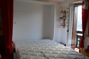 Katil atau katil-katil dalam bilik di Alpage - Studio 3 pers - Chatel Reservation