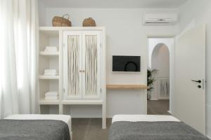Posteľ alebo postele v izbe v ubytovaní Kamvas Deluxe Apartments