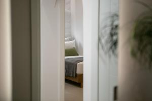 Posteľ alebo postele v izbe v ubytovaní Kamvas Deluxe Apartments