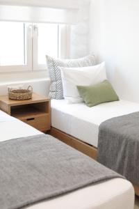 Posteľ alebo postele v izbe v ubytovaní Kamvas Deluxe Apartments