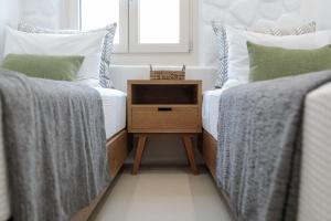 Posteľ alebo postele v izbe v ubytovaní Kamvas Deluxe Apartments