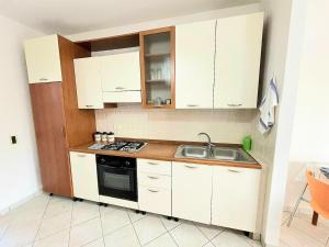 Kuchyňa alebo kuchynka v ubytovaní Casa Orchidea + 14 fotografií