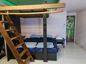 Postel nebo postele na pokoji v ubytování DDM House