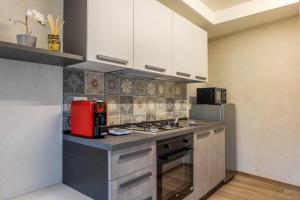Kuchyň nebo kuchyňský kout v ubytování Residenza LA FINESTRA SUL MAIRA + 5 fotografií