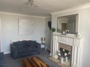 A seating area at Seafront, Cleethorpes apt’s