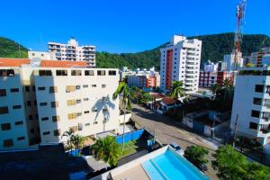 an aerial view of a city with tall buildings at Fb HOME Guaruja- Apartamento proximo as praias da Enseada e Pitangueiras - WI FI in Guarujá