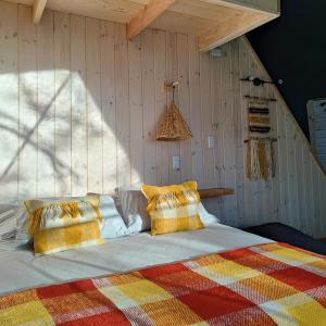 Postel nebo postele na pokoji v ubytování Malalcahuello Eco Glamp