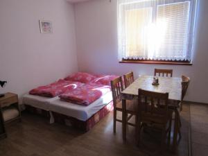 Postel nebo postele na pokoji v ubytování Apartmány Bobrovnik