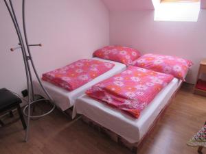 Postel nebo postele na pokoji v ubytování Apartmány Bobrovnik