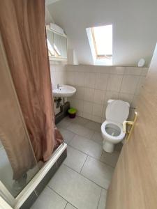 Koupelna v ubytování Budget Hotel Mannheim + 9 fotografií