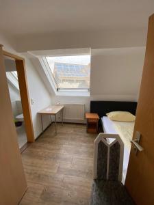 Postel nebo postele na pokoji v ubytování Budget Hotel Mannheim