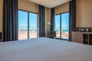Postel nebo postele na pokoji v ubytování Hotel Ibersol Atrio del Mar + 37 fotografií