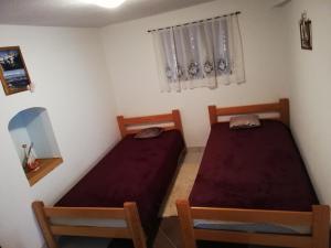 Posteľ alebo postele v izbe v ubytovaní Apartman Cvita