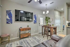 a living room with a couch and a table at Gorgeous Edinburg Getaway about 2 Mi to UTRGV! in Edinburg