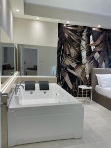 Postel nebo postele na pokoji v ubytování Suite 55 in centro