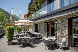 A restaurant or other place to eat at Hotel VIEW - incl Joker Card in Summer