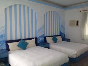 Voodi või voodid majutusasutuse Country Kos Hostel toas