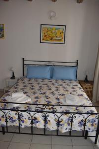Posteľ alebo postele v izbe v ubytovaní atocà3 casa vacanze - vedi anche atocà1 e atocà2