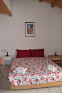 Posteľ alebo postele v izbe v ubytovaní atocà3 casa vacanze - vedi anche atocà1 e atocà2
