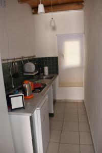 Kuchyňa alebo kuchynka v ubytovaní atocà3 casa vacanze - vedi anche atocà1 e atocà2
