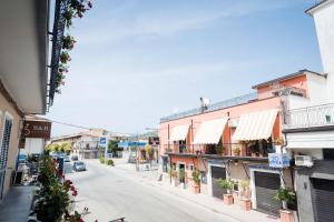 an empty street in a town with buildings at Palazzo ReSilente- B&B dell'Infopoint in Castelnuovo Cilento