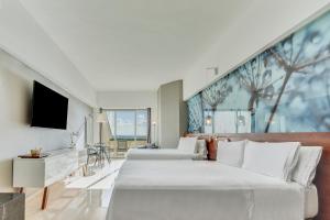 TV a/nebo společenská místnost v ubytování Live Aqua Cancun - Adults Only - All-Inclusive