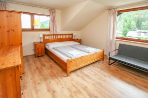 Łóżko lub łóżka w pokoju w obiekcie Bad&Ski Pension