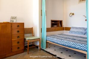 Postel nebo postele na pokoji v ubytování San Giorgio by PortofinoVip