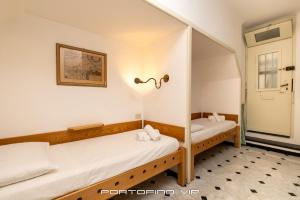 Postel nebo postele na pokoji v ubytování San Giorgio by PortofinoVip