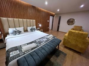 Ένα ή περισσότερα κρεβάτια σε δωμάτιο στο The Phoenix Residency