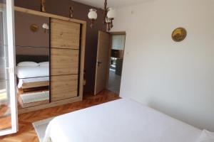 Postel nebo postele na pokoji v ubytování Apartment Walter