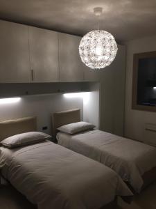 Posteľ alebo postele v izbe v ubytovaní Residence B&B il Connubio