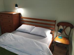מיטה או מיטות בחדר ב-Panorama