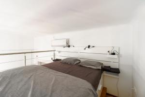 Posteľ alebo postele v izbe v ubytovaní Central Loft-style flat next to Danube