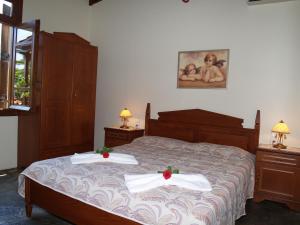 Posteľ alebo postele v izbe v ubytovaní Yiannis Cottage