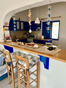 Η κουζίνα ή μικρή κουζίνα στο Comfortable house with seaview in Donousa
