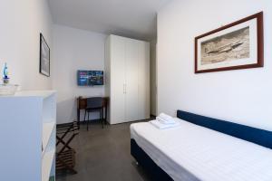 Letto o letti in una camera di Clover - 13 Piazza Pio XI