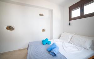 Posteľ alebo postele v izbe v ubytovaní Armonia House 1 bedroom 3 guests bath tub & patio