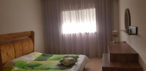 Postel nebo postele na pokoji v ubytování Apartment Haut standing Panamera Residence Khezema Sousse