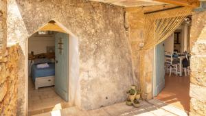 Kép Trullo Mmammineddhu by Salento Affitti szállásáról Torre San Giovanni Ugentóban a galériában