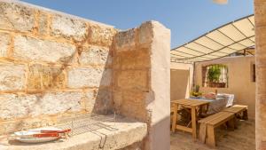 Kép Trullo Mmammineddhu by Salento Affitti szállásáról Torre San Giovanni Ugentóban a galériában