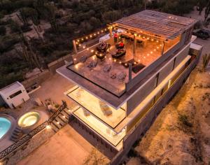 an overhead view of a house with a swimming pool and a bathroom at Baja and Kite in La Ventana