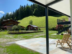 Vonkajšia záhrada v ubytovaní Apartment Steinplatte