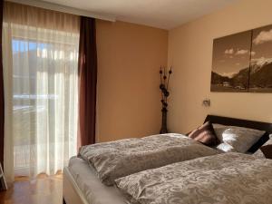 Posteľ alebo postele v izbe v ubytovaní Apartment Steinplatte