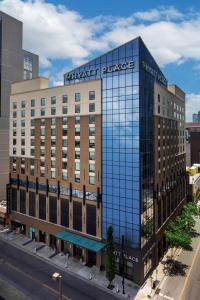 an office building with a sign on the side of it at Hyatt Place Nashville Downtown in Nashville